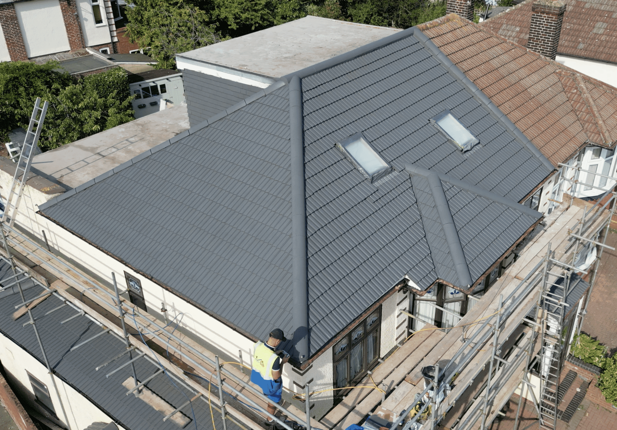 semi detached house with freshly re-coated roof - look brand new - anthracite colour - London